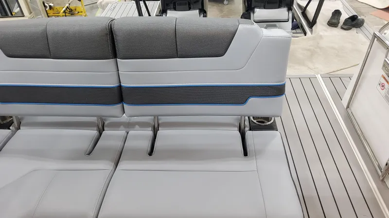 Slide: The Image of 2025 Formula 380 Super Sport Crossover OB boat interior seating with gray upholstery. - 48