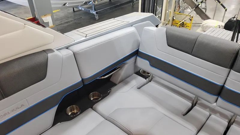 Slide: The Image of 2025 Formula 380 Super Sport Crossover OB interior seating with cup holders. - 49