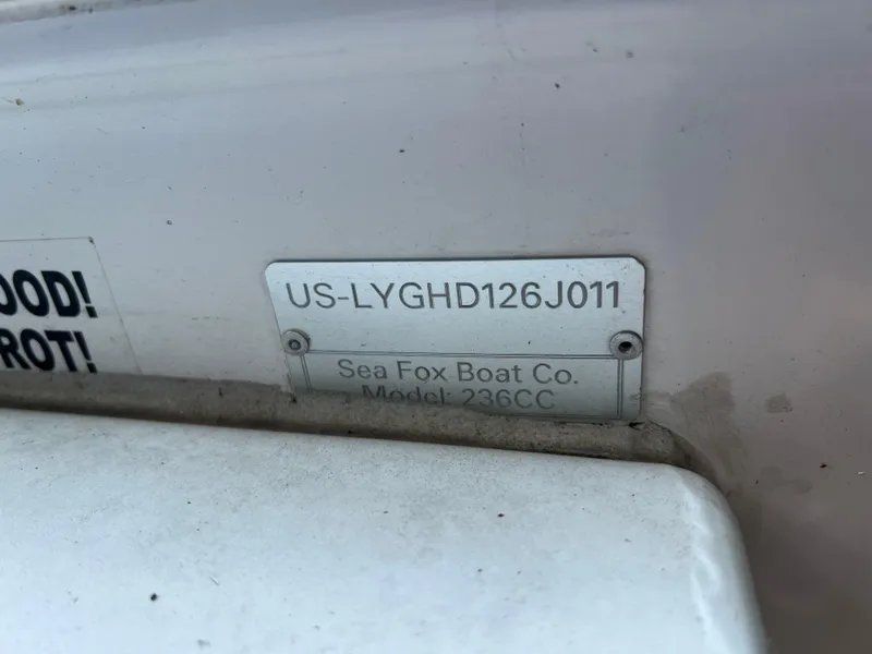 Slide: The Image of 2011 Sea Fox 236CC Pro Series boat identification plate with HIN: US-LYGHD126J011. - 10
