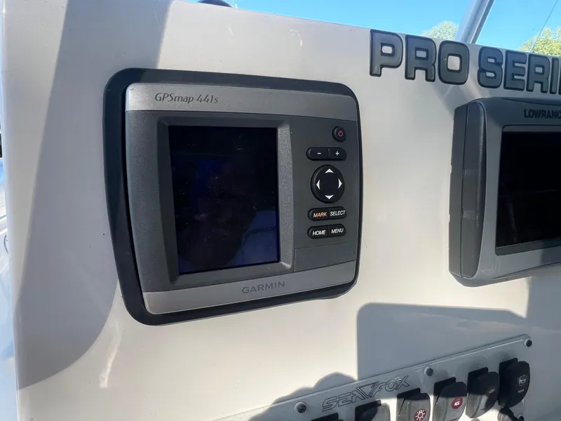 Slide: The Image of Garmin GPSmap 441s on 2011 Sea Fox 236CC Pro Series boat dashboard. - 13