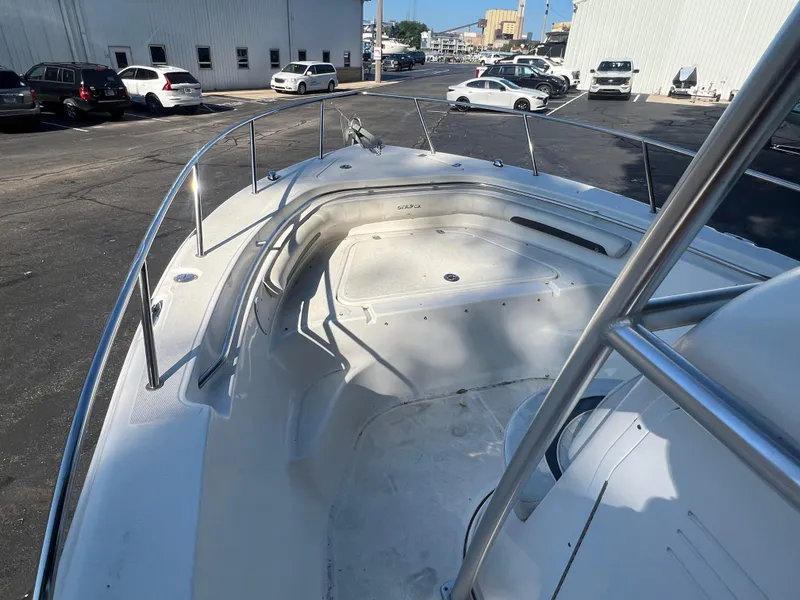 Slide: The Image of 2011 Sea Fox 236CC Pro Series boat bow view in a parking lot. - 17