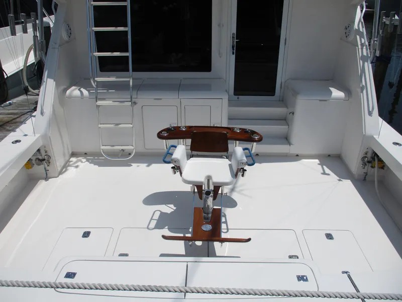 Slide: The Image of Bertram 60 Convertible 2000 yacht cockpit with fishing chair and ladder. - 18