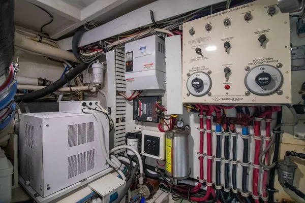 Slide: The Image of Electrical control panel and wiring in a 2000 Bertram CNV boat. - 36