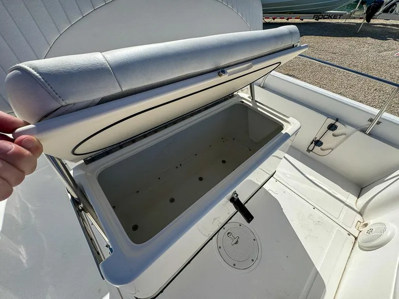 Slide: The Image of Open storage compartment on a 2007 Boston Whaler 220 Dauntless boat. - 16