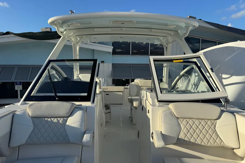 Slide: The Image of 2026 World Cat 280 DC-X boat interior with luxurious seating and modern design. - 23