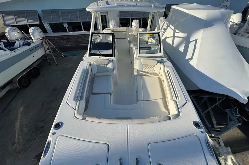 Slide: The Image of 2026 World Cat 280 DC-X boat with spacious seating and modern design. - 24