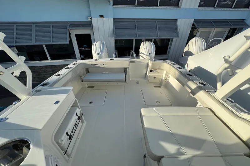 Slide: The Image of 2026 World Cat 280 DC-X boat interior with seating and storage compartments. - 25