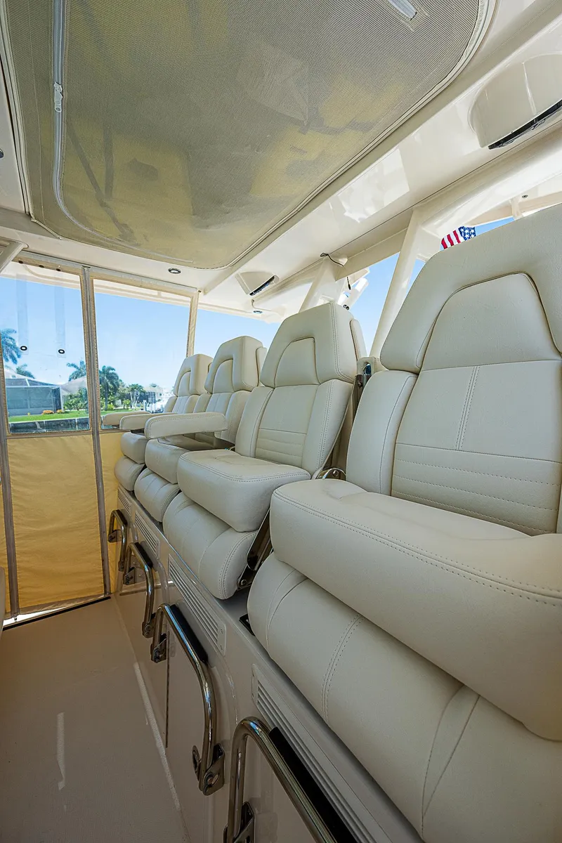 Slide: The Image of 2019 Grady-White Canyon 456 boat interior with luxurious seating - 26