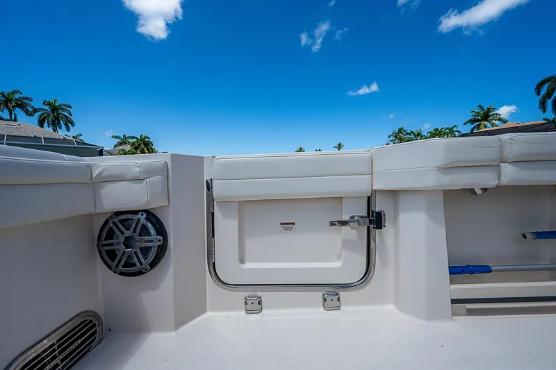Slide: The Image of 2019 Grady-White Canyon 456 boat interior with seating and storage compartment. - 35