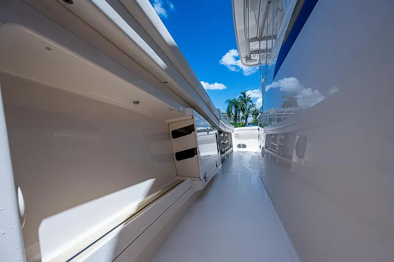 Slide: The Image of 2019 Grady-White Canyon 456 boat interior with clear blue sky background. - 39