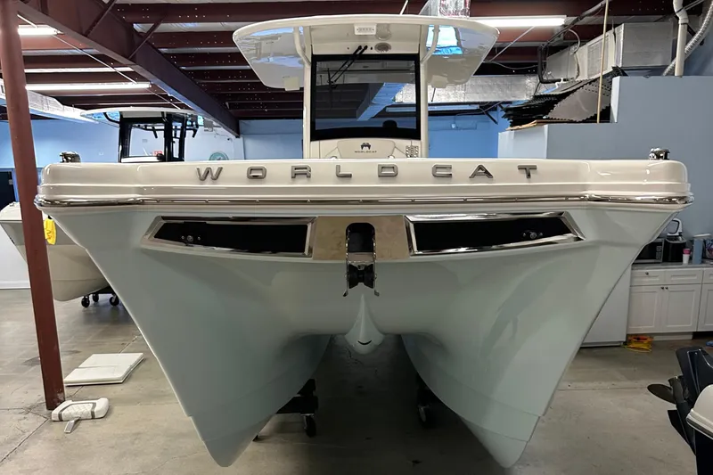 Slide: The Image of 2025 World Cat 280 CCX boat in a warehouse, front view. - 16