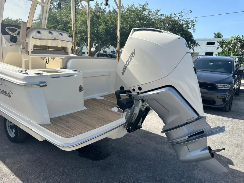 Slide: The Image of 2025 Scout 240 XSF boat with Mercury outboard engine, rear view. - 3