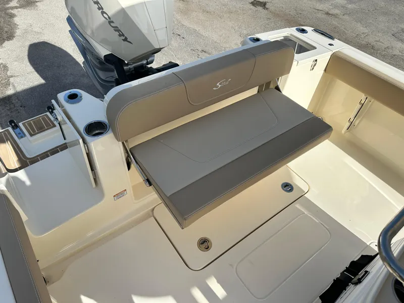 Slide: The Image of 2025 Scout 240 XSF boat with Mercury engine and foldable seating. - 4