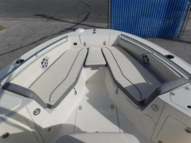 Slide: The Image of 2024 Stingray 216 CC boat with spacious seating and modern design. - 28