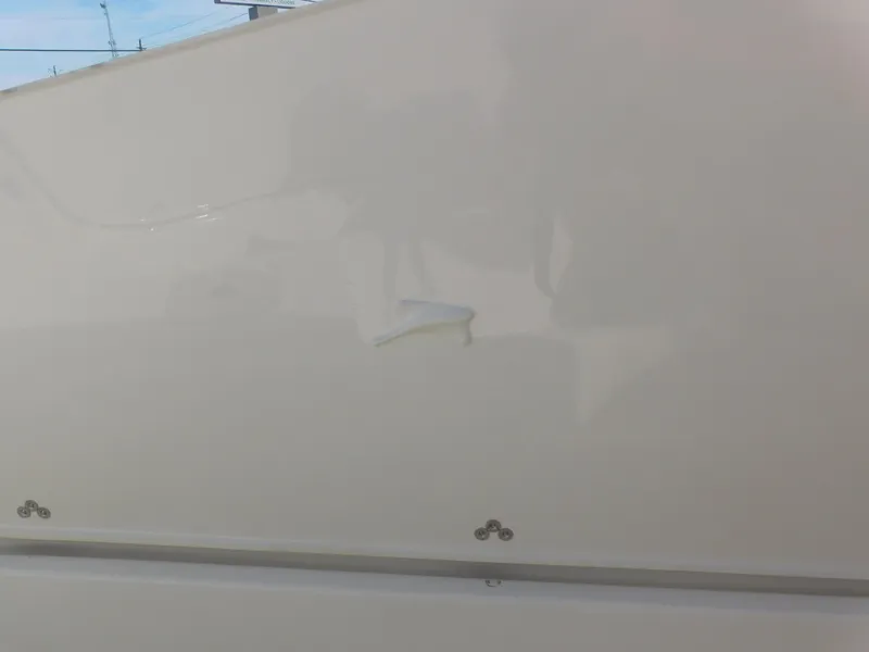 Slide: The Image of 2024 Stingray 216 CC boat exterior close-up. - 30