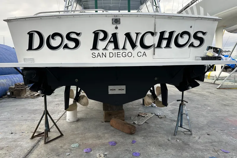 Slide: The Image of 1997 Cabo 35 Express boat named "Dos Panchos" in San Diego, CA, on dry dock. - 30