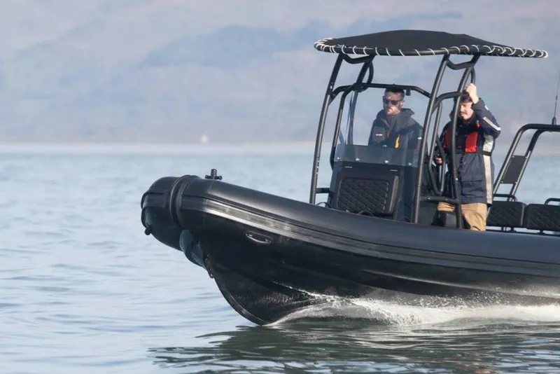 Slide: The Image of 2026 Highfield Patrol 660 boat on calm water. - 4