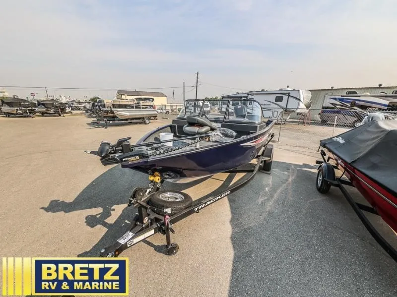 Slide: The Image of 2025 Pro Guide V-175 WT boat on trailer at Bretz RV & Marine dealership. - 3