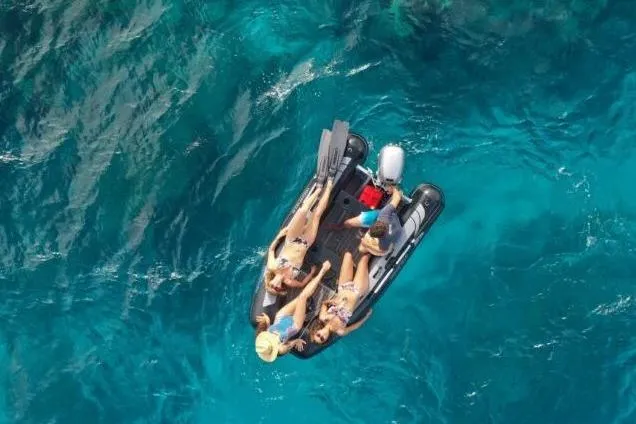 Slide: The Image of Aerial view of Highfield Classic 290 boat in blue water, 2025 model. - 9