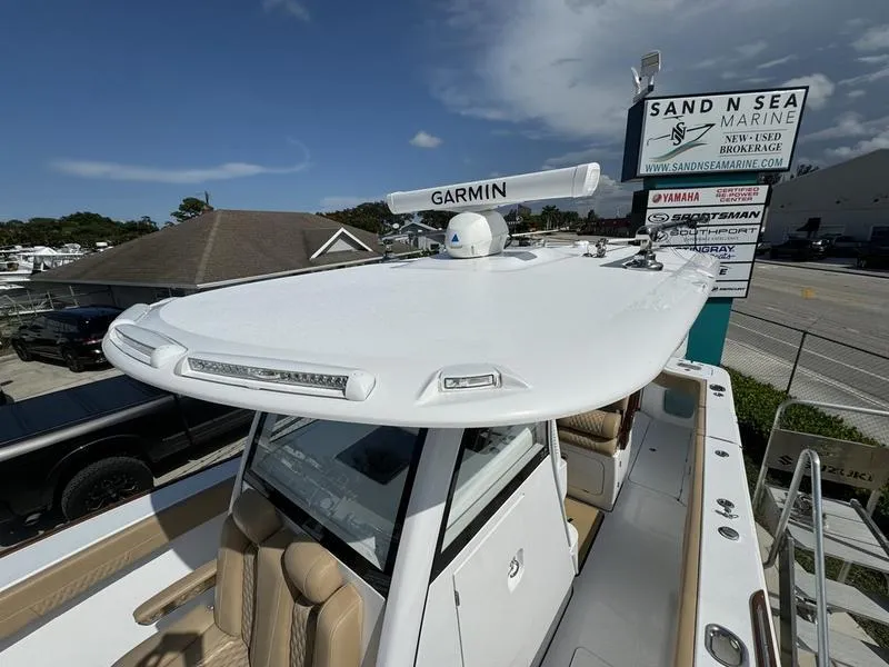 Slide: The Image of Phenom 34 boat with Garmin radar at Sand N Sea Marine dealership, 2023 model. - 22