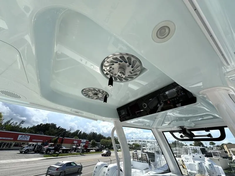 Slide: The Image of 2023 Phenom 34 boat interior with speakers and control panel. - 29