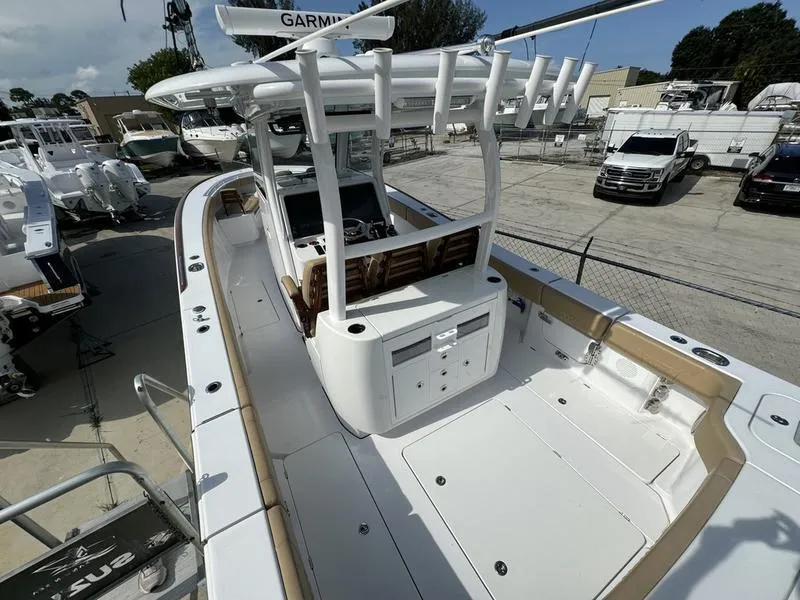 Slide: The Image of 2023 Phenom 34 boat with spacious deck and modern navigation equipment. - 44