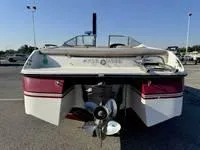 Slide: The Image of 1996 Four Winns 190 Horizon boat rear view with propeller. - 20