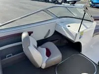 Slide: The Image of 1996 Four Winns 190 Horizon boat interior with seating and dashboard. - 21