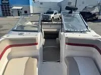 Slide: The Image of 1996 Four Winns 190 Horizon boat interior with seating and windshield. - 25