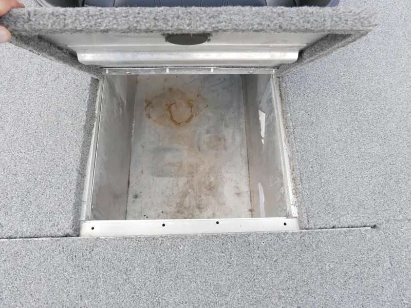 Slide: The Image of Open storage compartment in a 2022 Tracker Pro 170 boat. - 10