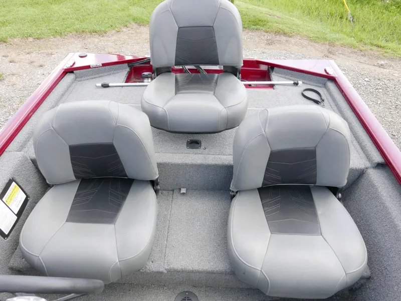 Slide: The Image of 2022 Tracker Pro 170 boat interior with three gray seats. - 12