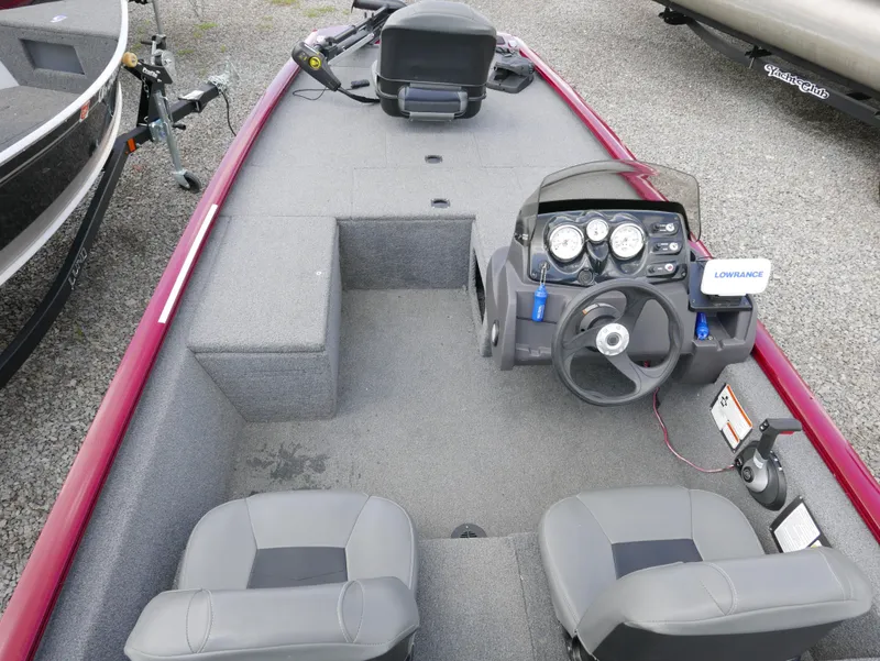 Slide: The Image of 2022 Tracker Pro 170 boat interior with steering console and seating. - 13