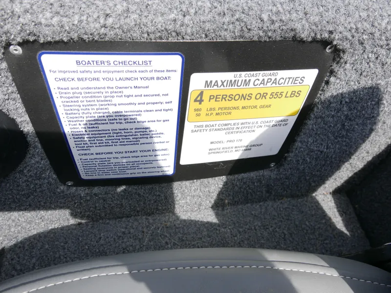Slide: The Image of 2022 Tracker Pro 170 boat capacity and safety checklist labels. - 18