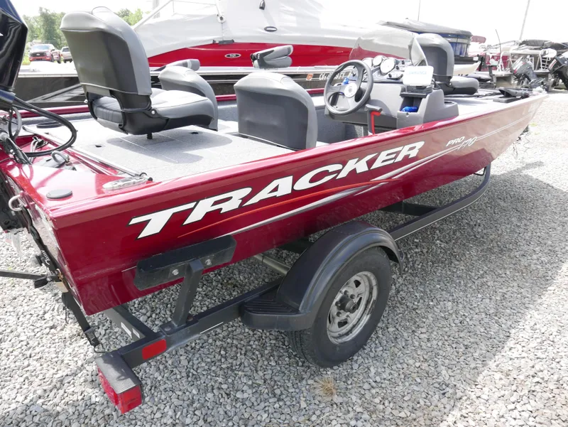 Slide: The Image of 2022 Tracker Pro 170 fishing boat on trailer, red color. - 2