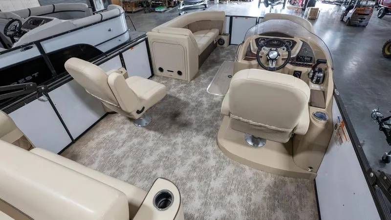 Slide: The Image of Interior of 2021 Crest Classic Platinum 220 SLSC pontoon boat with beige seating. - 23