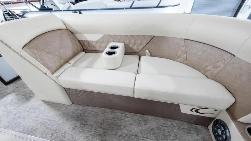 Slide: The Image of 2021 Crest Classic Platinum 220 SLSC boat interior seating with cup holders. - 8