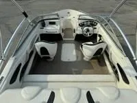 Slide: The Image of 2008 Stingray 195 LX boat interior with seating and steering wheel. - 20