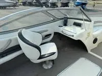Slide: The Image of 2008 Stingray 195 LX boat interior with white and black seating. - 21