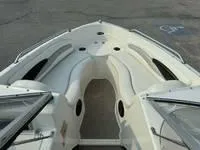 Slide: The Image of 2008 Stingray 195 LX boat interior with seating and storage compartments. - 24