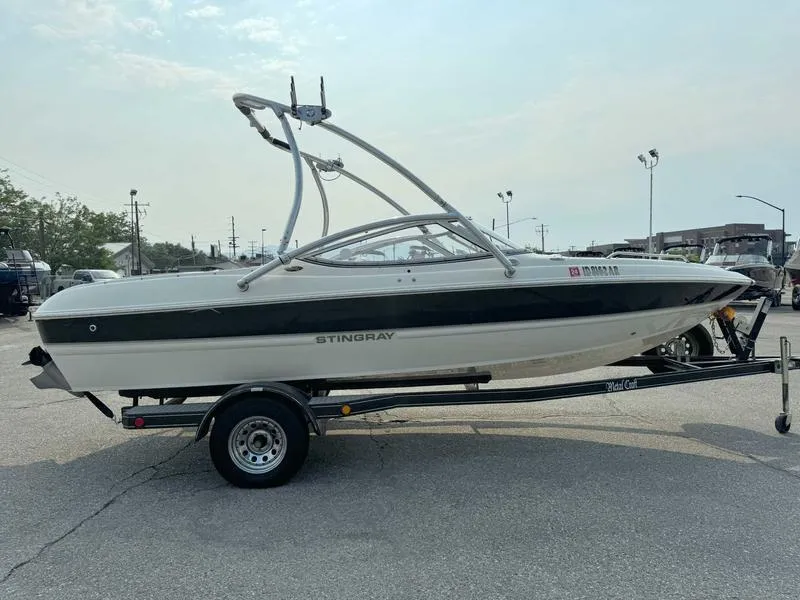 Slide: The Image of 2008 Stingray 195 LX boat on trailer, side view. - 6