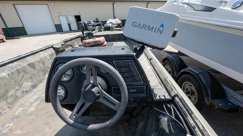 Slide: The Image of 2003 War Eagle 754 LDSV boat dashboard with Garmin navigation system. - 15