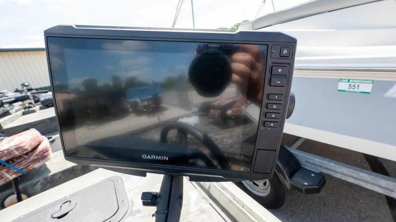 Slide: The Image of Garmin fishfinder on a 2003 War Eagle 754 LDSV boat. - 16