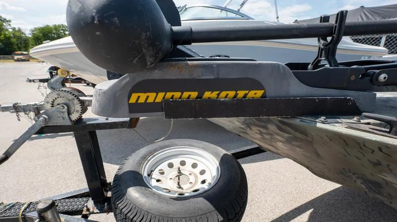Slide: The Image of 2003 War Eagle 754 LDSV boat with Minn Kota trolling motor on trailer. - 4