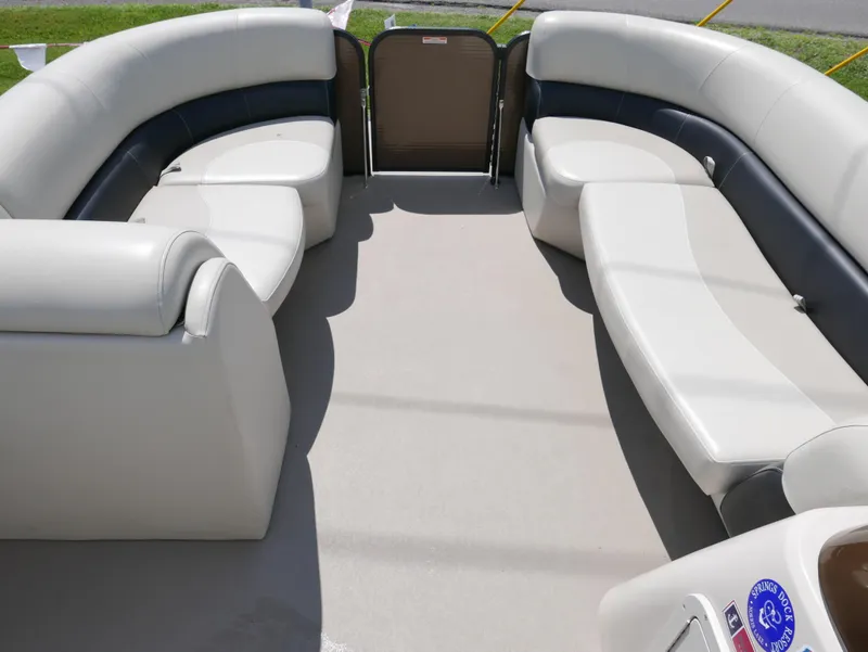Slide: The Image of 2019 Manitou 23 Aurora VP pontoon boat interior with spacious seating. - 9