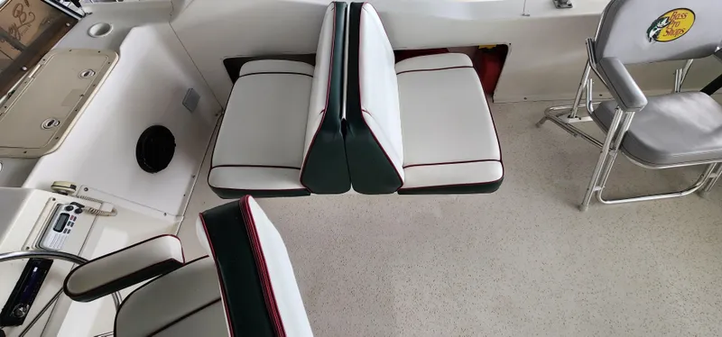 Slide: The Image of Interior seating of a 1993 Gibson 50 Cabin Yacht with white and black upholstery. - 20