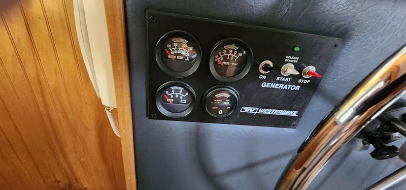 Slide: The Image of Control panel of a 1993 Gibson 50 Cabin Yacht generator. - 40