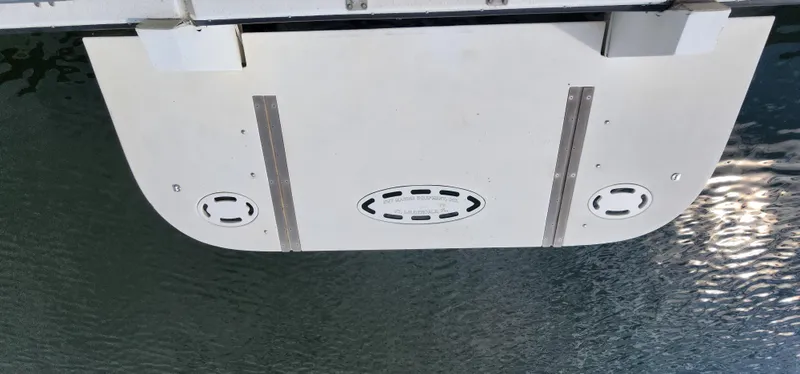 Slide: The Image of 1993 Gibson 50 Cabin Yacht stern platform over water. - 6