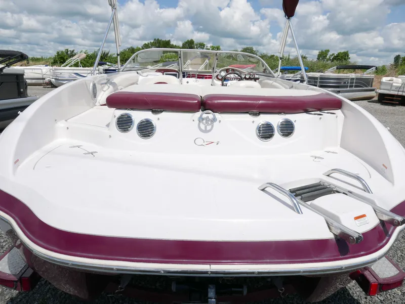 Slide: The Image of 2011 Tahoe Q7SSF1 boat with maroon and white interior, rear view. - 5