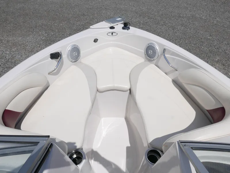 Slide: The Image of Interior seating of a 2011 Tahoe Q7SSF1 boat with white upholstery. - 6