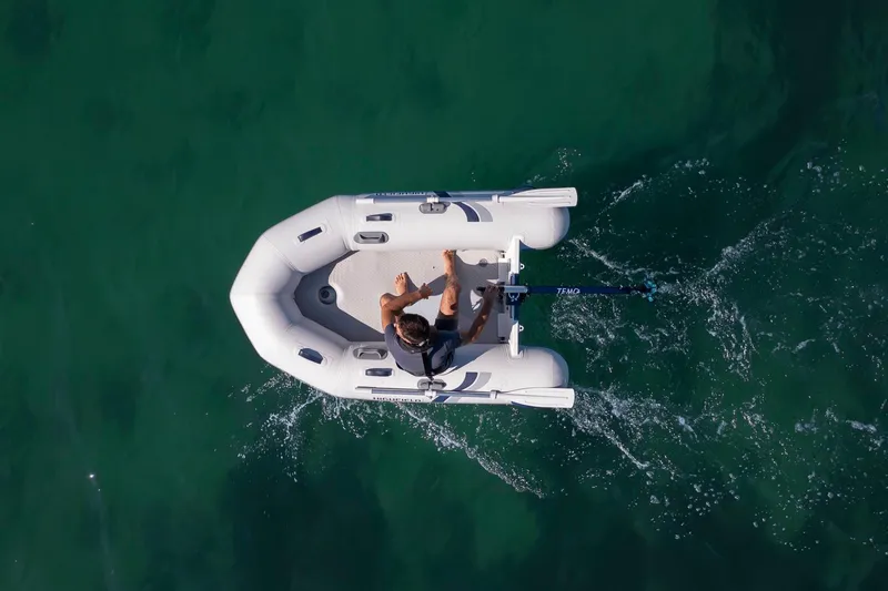 Slide: The Image of Aerial view of Highfield Roll-Up 250 KAL boat on water. - 8